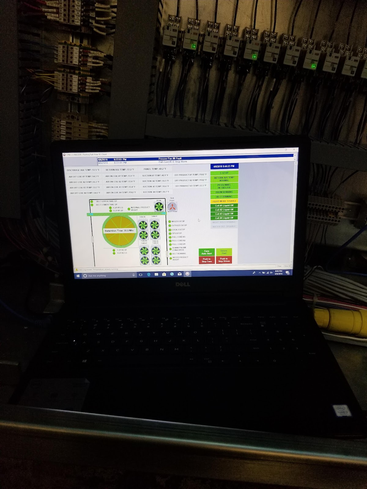 Laptop showing a process-control overview in the shop.