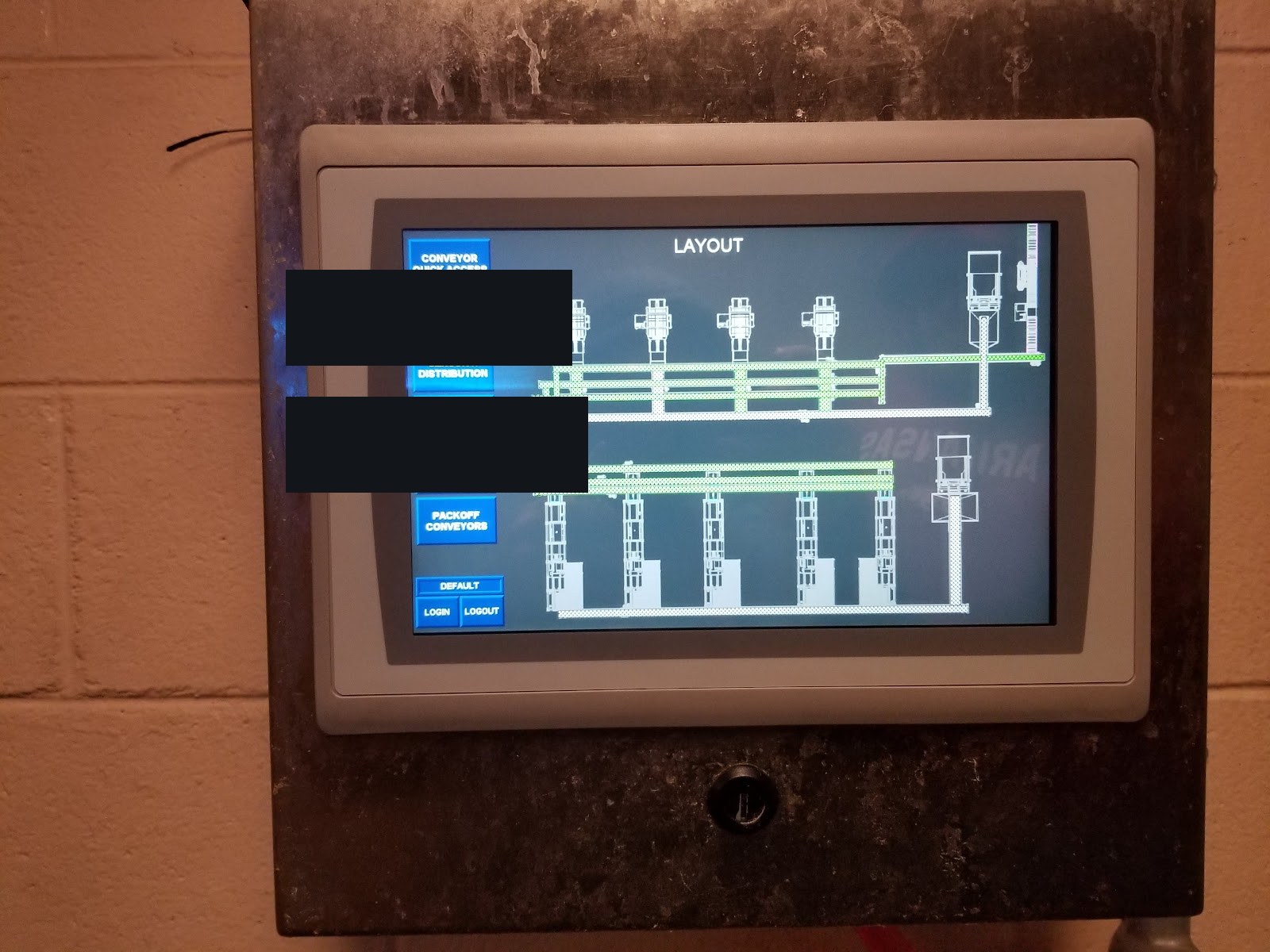 HMI conveyor layout screen on a stainless door.