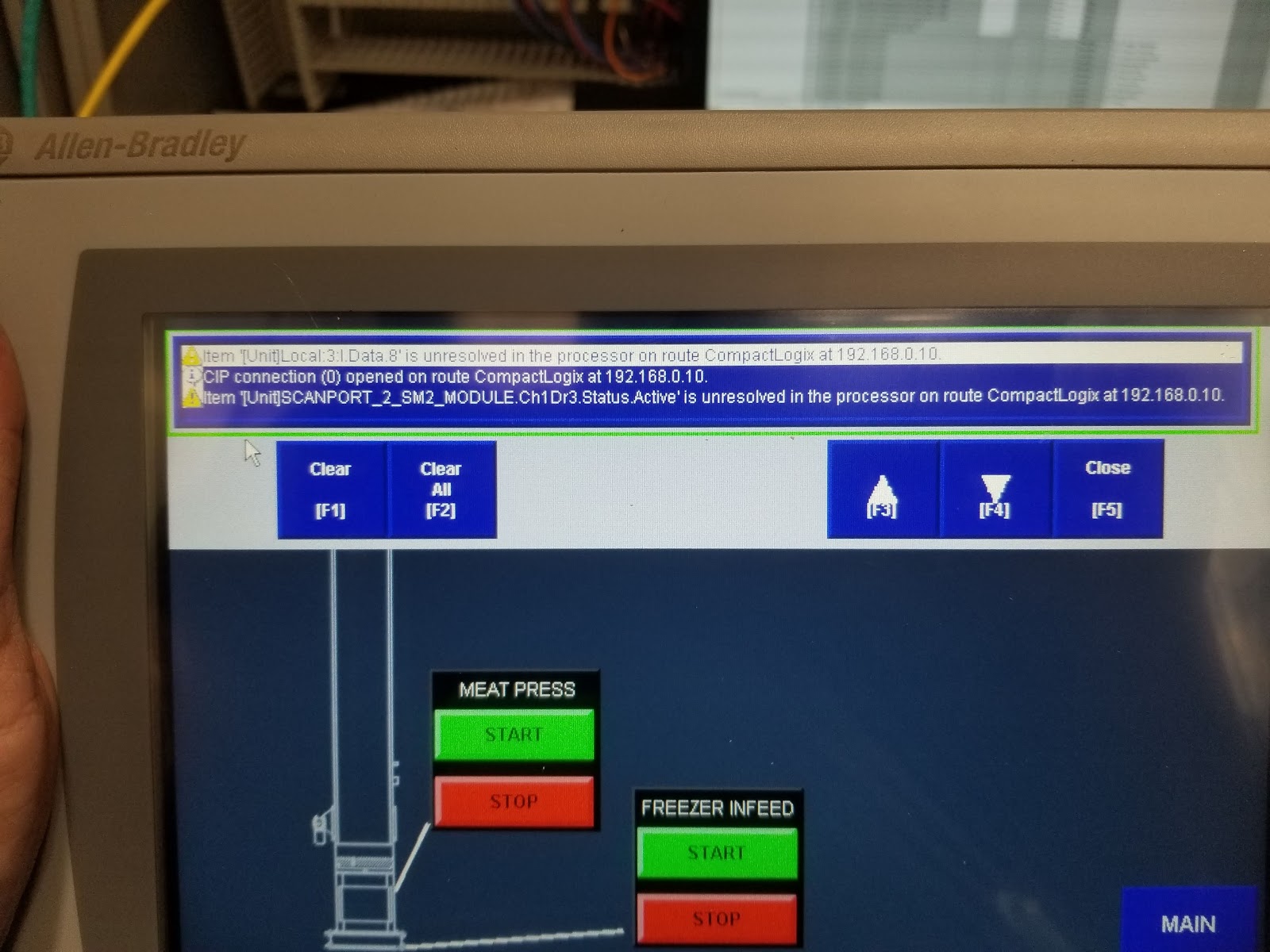 HMI with Auto/Manual, temperature status, and menu controls.