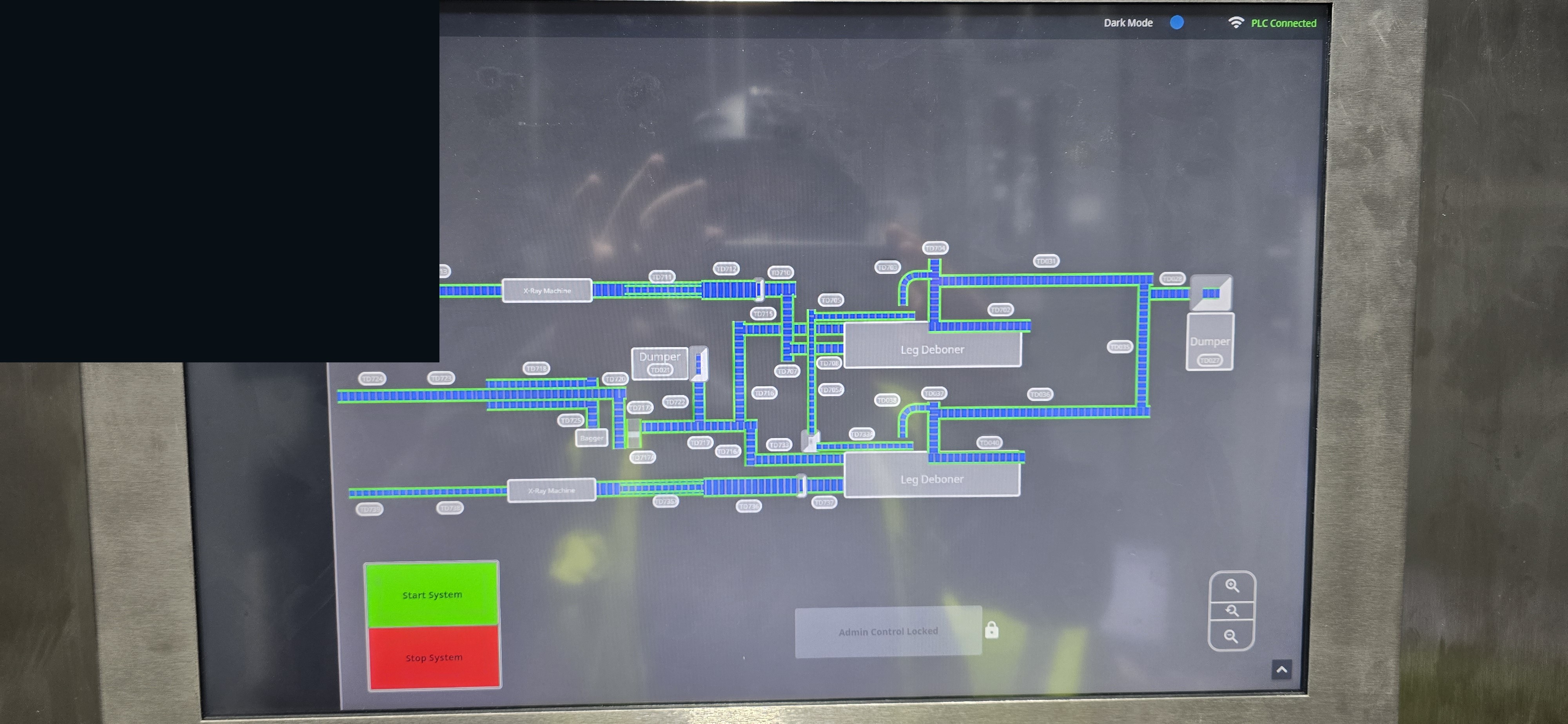 Dark-mode HMI packout layout with start and stop and PLC connected.